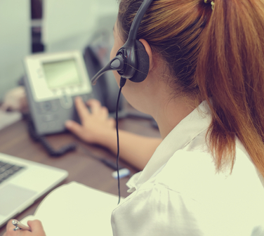 call center employee making a phone call