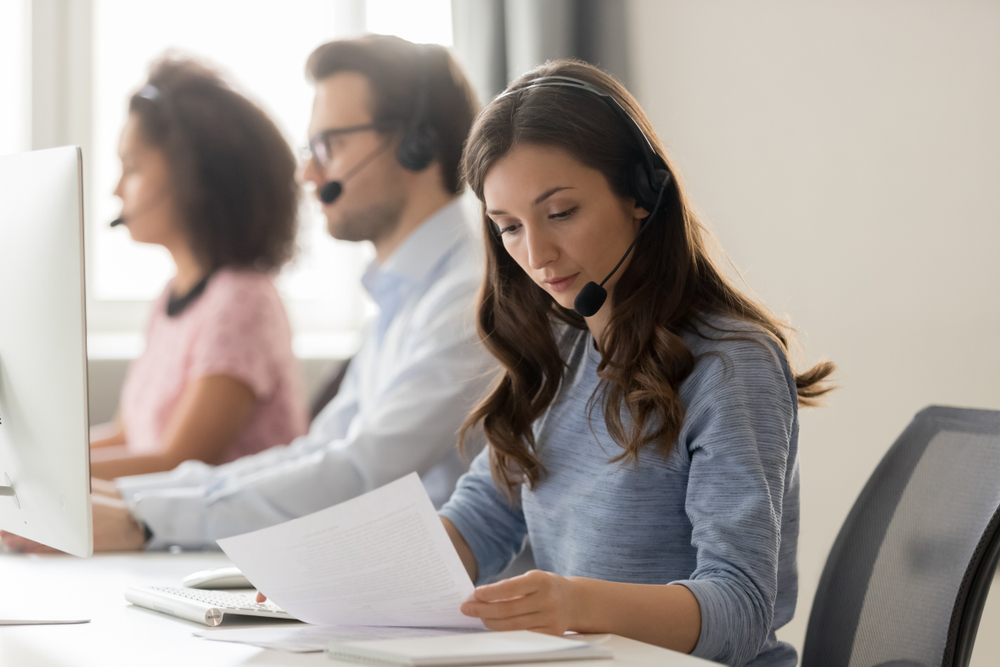 sales woman reviewing documents