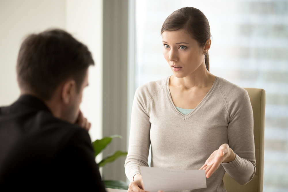 boss having private meeting with employee