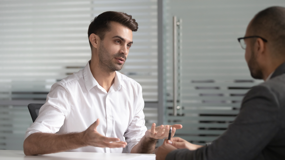 manager having meeting with employee