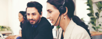 colleagues smiling in call center