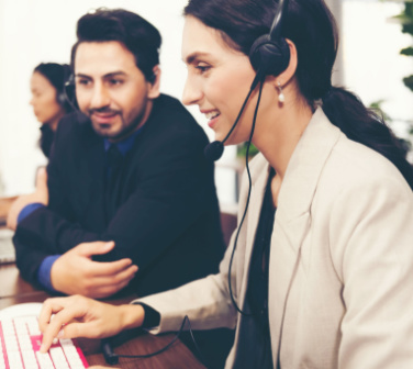 colleagues smiling in call center