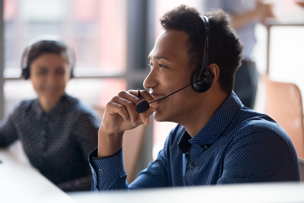 man with head set on at work