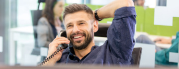 man on phone making small talk with customer