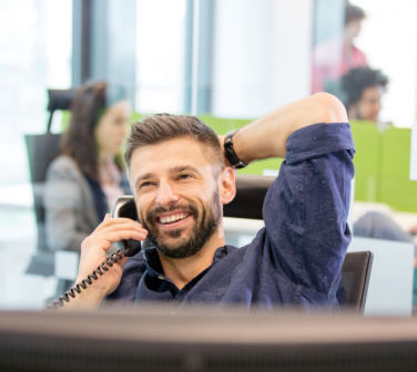 man on phone making small talk with customer