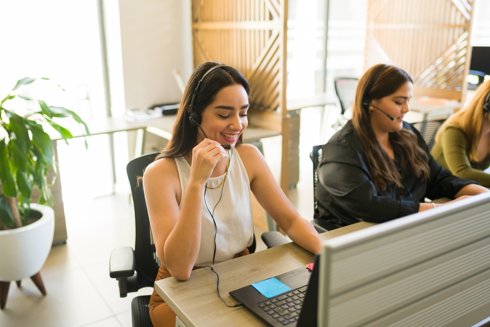 Smiling female call center worker