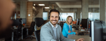 smiling male call center employee