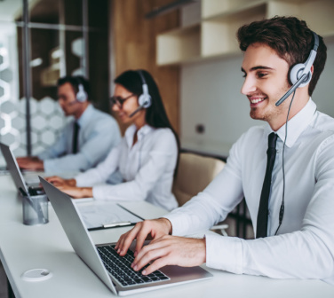 smiling call center workers