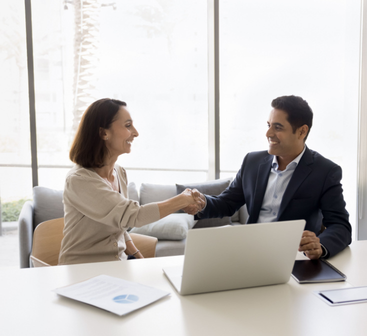 Business people shaking hands at the beginning of job interview
