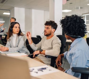 Co-worker sales reps talk about best customer service practices - best call center jobs in Tijuana.