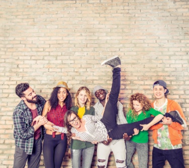 A group of call center co-workers have fun at work.