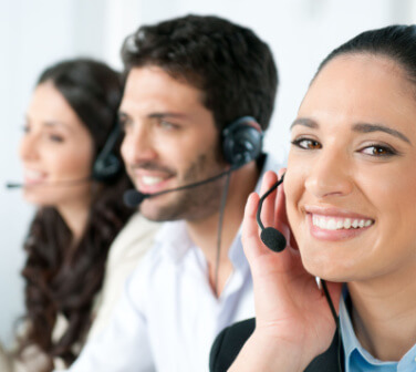 Smiling young bilingual call center worker, best jobs in Tijuana.