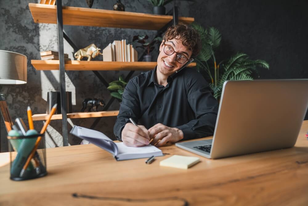 Professional practicing positive self talk at work while staying organized and focused during the workday.