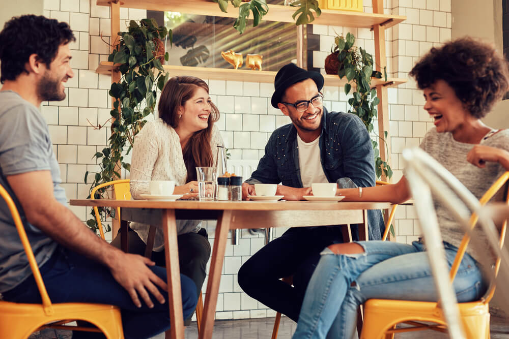 Group of friends and workmates get together for a cup of coffee and relaxation - great call center jobs in Tijuana.