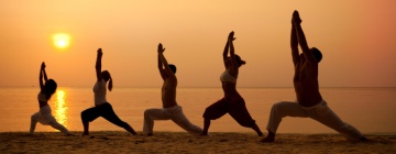Yoga on the beach for a healthy lifestyle, best call center jobs in Tijuana.