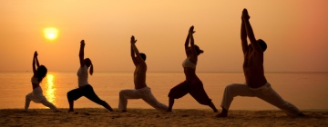 Yoga on the beach for a healthy lifestyle, best call center jobs in Tijuana.