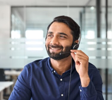 Agent smiling, understanding the importance of customer service in the success of their career - best call center in Tijuana