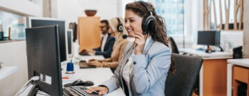 Team of call center employees working together on office - Seguros Confie, Best Call Center in Tijuana.