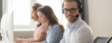 Smiling call center male worker - Seguros Confie, Best Call Center in Tijuana.