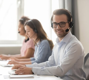 Smiling call center male worker - Seguros Confie, Best Call Center in Tijuana.