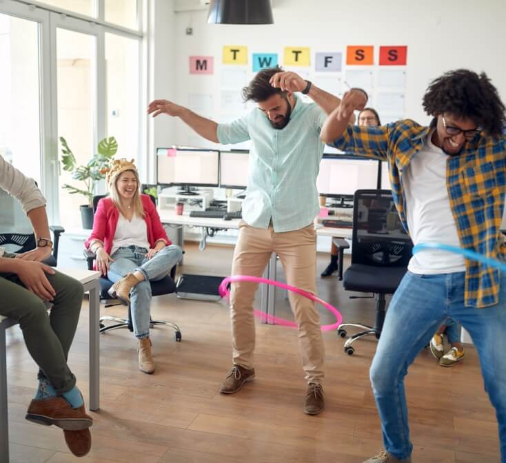 Employees at a call center in Tijuana engage in light-hearted games to reduce stress.