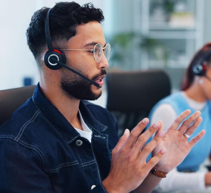 Call center agent talking with customer about support, advice and online consultation.