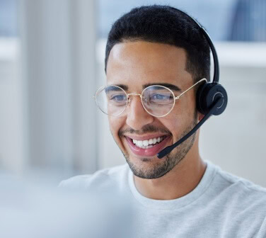 Customer service rep Hispanic man smiling