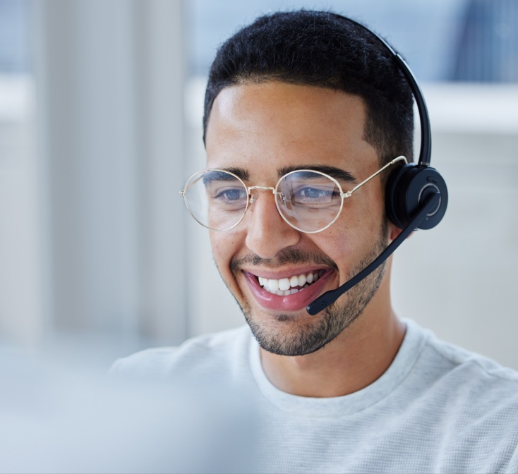 Customer service rep Hispanic man smiling