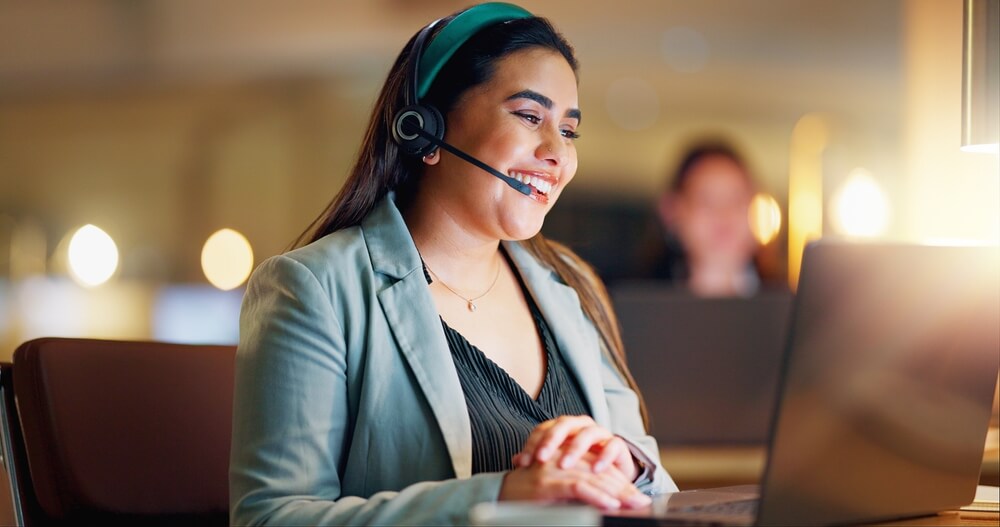 Smiling young woman in customer service.