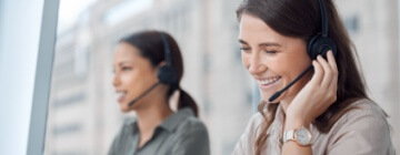 Call center, smile and business woman consulting for crm, contact us and telemarketing in office. Happy, customer service and female consultant with friendly service in online help, support or advice.