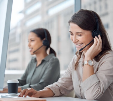 Call center, smile and business woman consulting for crm, contact us and telemarketing in office. Happy, customer service and female consultant with friendly service in online help, support or advice.
