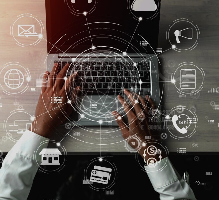 Image of a man's hands on a laptop with illustrative images floating around illustrating omnichannel communication - best call center jobs in Tijuana.