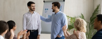 Company leader introduces new worker to the group - best call center jobs in Tijuana.