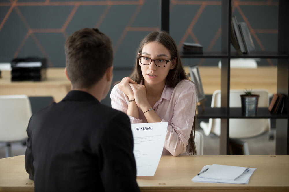 Young applicant having an interview with a hiring manager - best call center jobs in Tijuana.