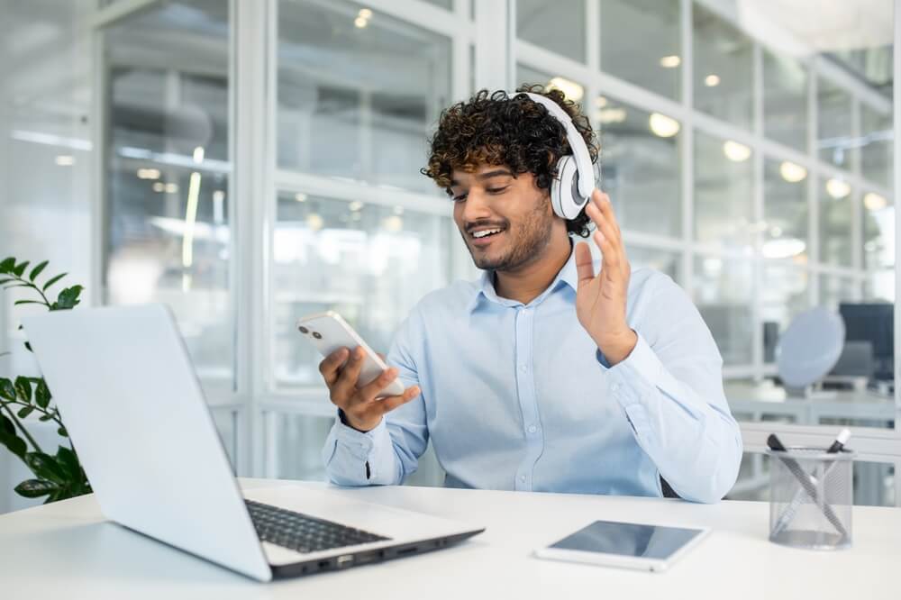 Call center worker uses multitasking to connect with customers.