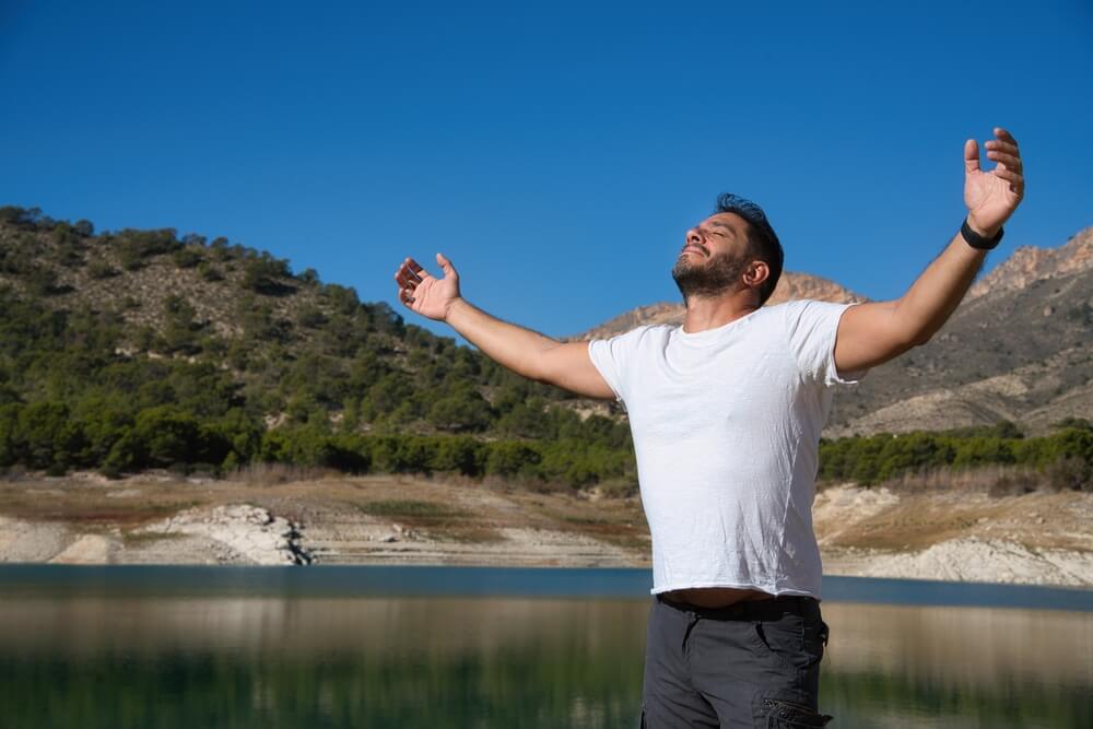 Adult Man Breathing Fresh Air in the Park or Forest. It can be used or mental health, inspiration, and well-being. Suitable for projects conveying messages of relaxation, stress reduction - best call center job in Tijuana.