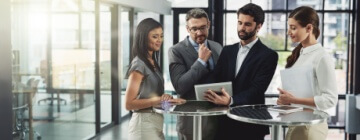 People, business and tablet in office with collaboration, meeting and agenda for company project. Networking for professionals in Tijuana call center with teamwork.
