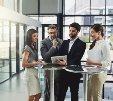 People, business and tablet in office with collaboration, meeting and agenda for company project. Networking for professionals in Tijuana call center with teamwork.