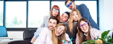 Young people call center employee workers taking happy selfie with stick, life style concept of call center social perks.