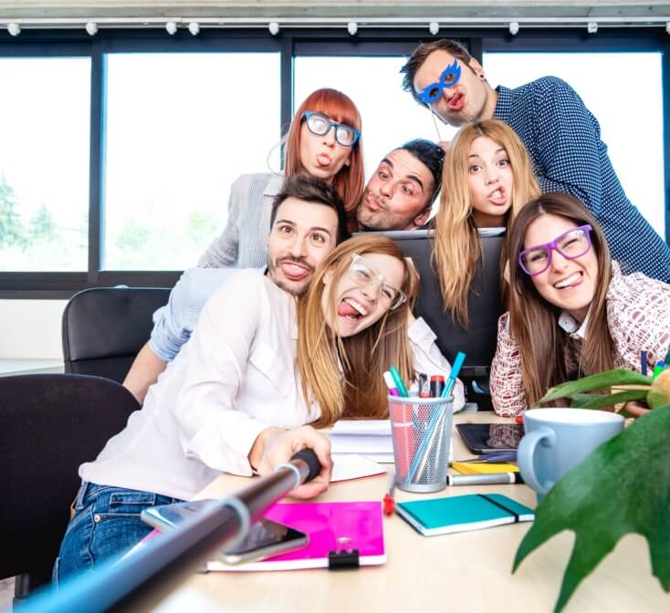 Young people call center employee workers taking happy selfie with stick, life style concept of call center social perks.