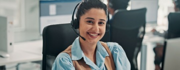 service representative assisting a caller, demonstrating handling feedback professionally with empathy and clear communication