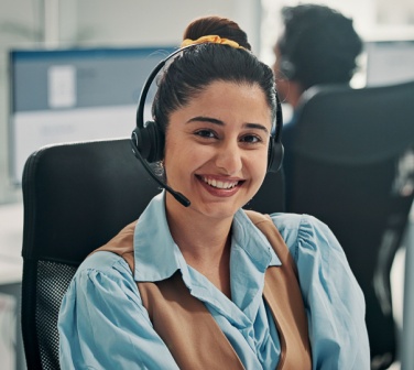 service representative assisting a caller, demonstrating handling feedback professionally with empathy and clear communication