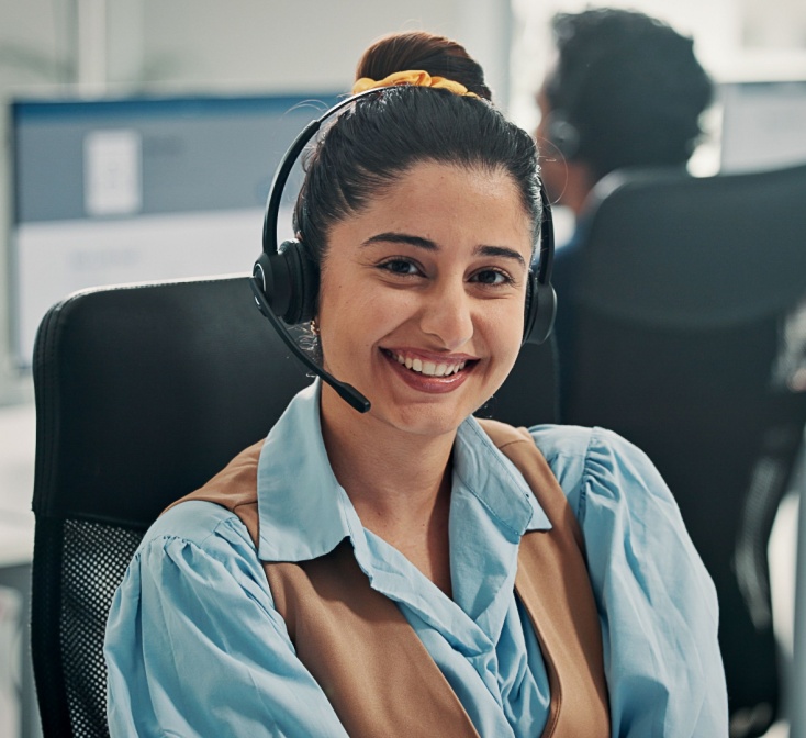 service representative assisting a caller, demonstrating handling feedback professionally with empathy and clear communication