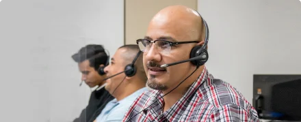 Side view of three call center agents.