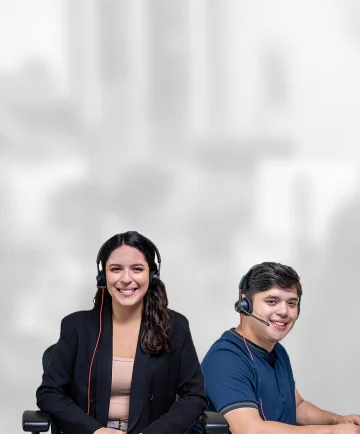 Woman call center agent smiling with her coworker.
